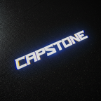 Capstone Text LED Puddle Light — Top Down Projection on Wet Asphalt