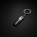 F Sport Black Vertical Keychain — Hero Flat Lay