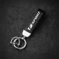 F Sport Carbon Silver Keychain — Hero Flat Lay