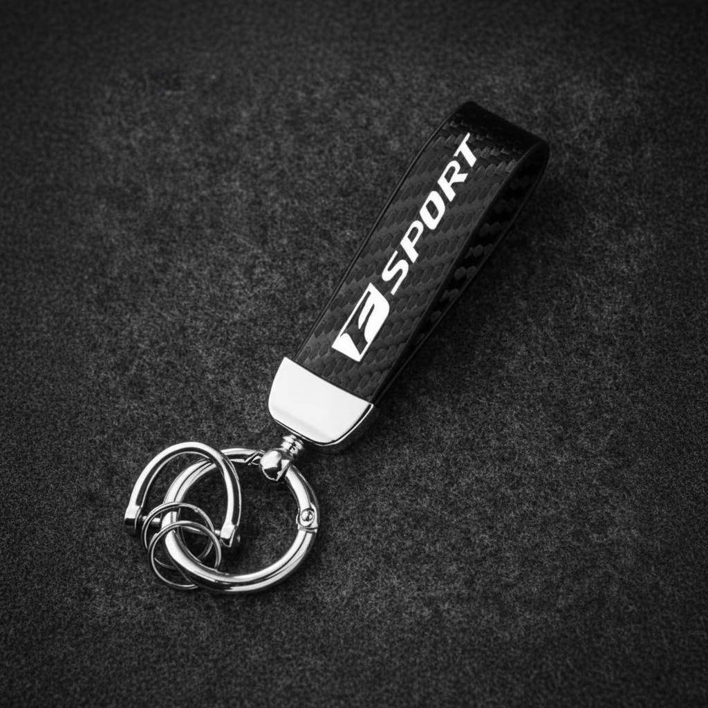 F Sport Carbon Silver Keychain — Hero Flat Lay