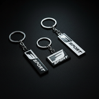 F Sport Metal Tag Keychains — Hero Flat Lay