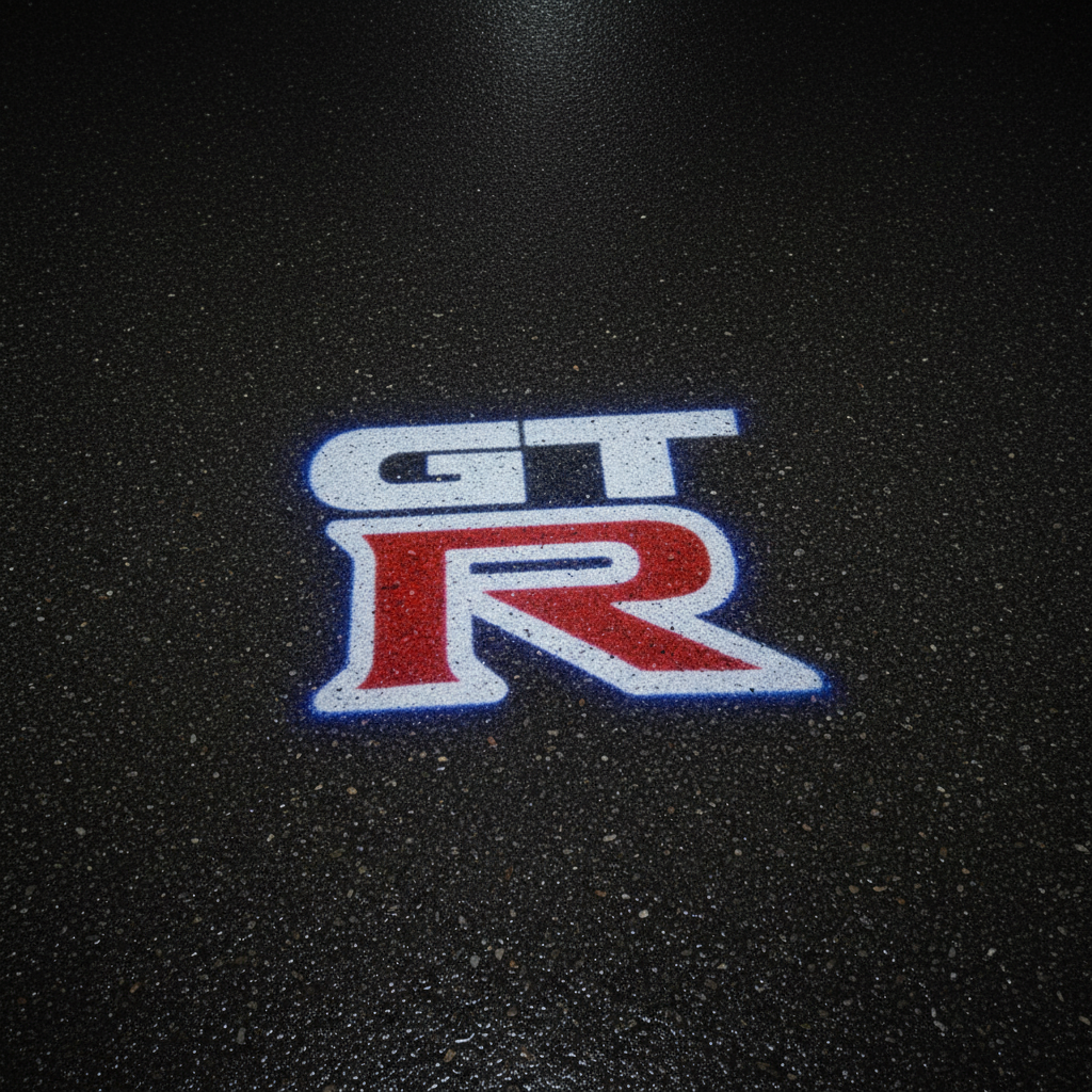 GT-R LED Puddle Light — Top Down Projection on Wet Asphalt