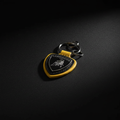 Lamborghini Leather Keychain — Hero Flat Lay