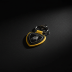 Lamborghini Leather Keychain — Hero Flat Lay