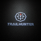 TRAILHUNTER Top-Down Puddle Light on Wet Asphalt