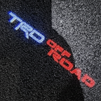 TRD Off Road LED Puddle Light — Top Down Projection on Wet Asphalt