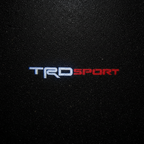 TRD Sport LED Puddle Light — Top Down Projection on Wet Asphalt