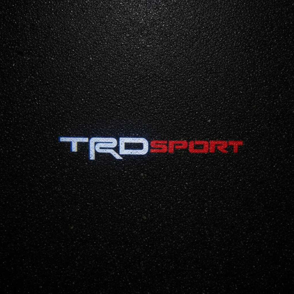 TRD Sport LED Puddle Light — Top Down Projection on Wet Asphalt