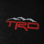 TRD Top-Down Puddle Light on Wet Asphalt