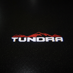 TUNDRA Top-Down Puddle Light on Wet Asphalt